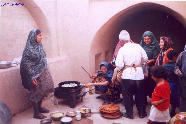 Preparing food (komaach?) for a gahambar in Mazraa Kalantar, Yazd, Iran