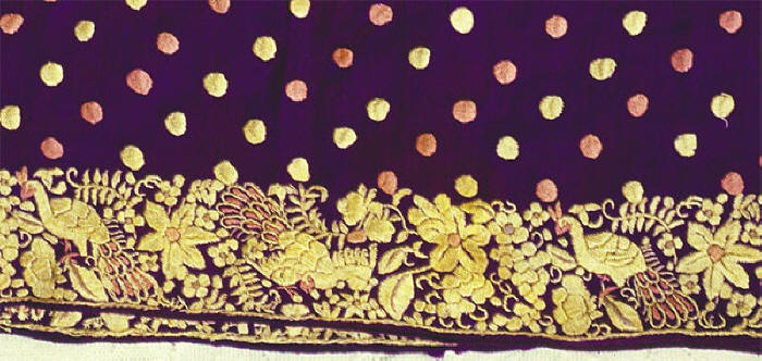 The kanda-papeta design on a gara blouse from the early 20th cent. The border design does seem to have a peacock that a few Parsees shun.