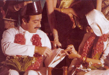 The couple exchange wedding rings