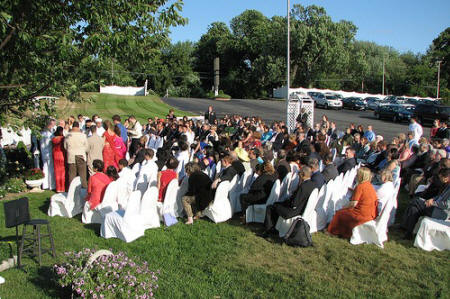 Ara Antar: Couple facing one another Sheet hung between the couple