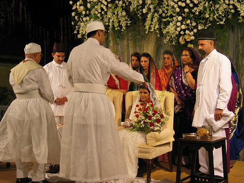 1 & 2. Priest bless and question the couple