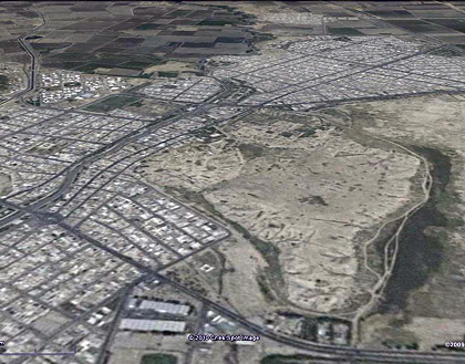 Modern day (2009) aerial view of Susa<br>Note the sprawling urbanization around the site