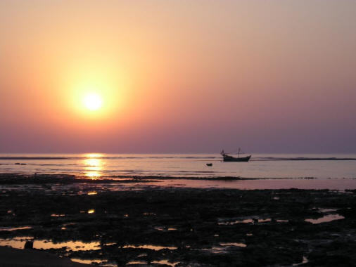 Sunset and a fishing boat