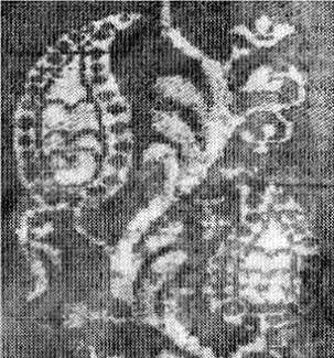 Detail of the leaf motif from the panel below