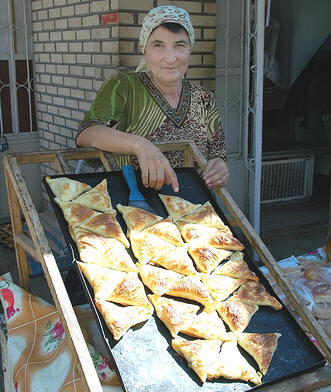 Somsa freshly baked at a Khiva bazaar