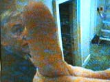 Black, points at the security camera when the boxes were being removed