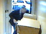 Conrad Black removing boxes from Hollinger Inc. to his car