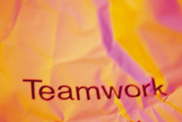 Fabric with an image of the words teamwork